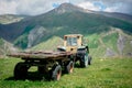 Old tractor in the Caucasus mountains Royalty Free Stock Photo