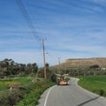 An old tractor on a country road of Athienou town in Cyprus Island Royalty Free Stock Photo