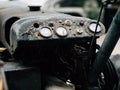 Old tractor dashboard. Vintage farm tools.