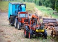 Old tractor and equipment used in timber industry. Royalty Free Stock Photo