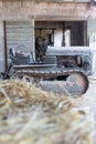 Old tractor on a farm that also has bovine breeding Royalty Free Stock Photo