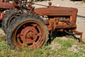 Old tractor missing front wheel