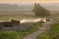 Old tractor pig farm and dusty road Royalty Free Stock Photo