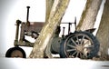 An Old Tractor Sits Abandoned in the Trees Royalty Free Stock Photo