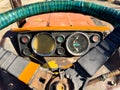 Old tractor steering wheel and speedometer closeup Royalty Free Stock Photo