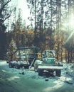 Old tractor with a trailer against forest in winter Royalty Free Stock Photo