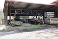 Old tractor and trailer on a farm in the countryside. Industrial background Royalty Free Stock Photo