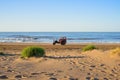 old tractor used to tow fishing boats circulated on the beach. Royalty Free Stock Photo