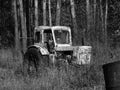 Old tractor in the woods Royalty Free Stock Photo