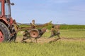 Old tractor working on the field Royalty Free Stock Photo