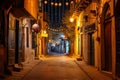 Old traditional arabic street in night with ramadan garlands and crescent moon