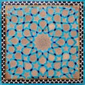 Old, traditional ceramic tiles, pattern of flowers and ornaments, on the wall of the mosque in Yazdu, Iran