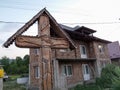 Old traditional crucifix near a house in Maramures ,Romania Royalty Free Stock Photo