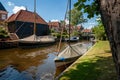 View of old canals with boats in an old Dutch town. Royalty Free Stock Photo