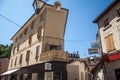 Old traditional French architecture buildings in a village commercial street of Bourgoin-Jallieu