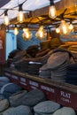 Old traditional hat store on camden market in London in dusk.