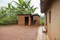 Old traditional house in Rwanda made of animals dung, clay and hay Royalty Free Stock Photo