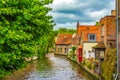 Cute old canalside houses Bruges city view at summer day Belgium Royalty Free Stock Photo
