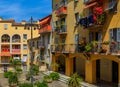 Old traditional houses and a courtyard in the Old Town Vielle Ville in Nice in the South of France Royalty Free Stock Photo