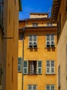 Old traditional houses in the narrow streets in the Old Town Vielle Ville in Nice in the South of France Royalty Free Stock Photo