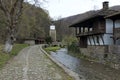 Old traditional houses, old traditional clock tower and river with bridge in Etar