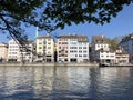 Old traditional houses and residential buildings along the river Limmat in the city of Zurich Royalty Free Stock Photo