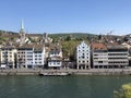 Old traditional houses and residential buildings along the river Limmat in the city of Zurich Royalty Free Stock Photo