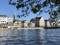 Old traditional houses and residential buildings along the river Limmat in the city of Zurich Royalty Free Stock Photo