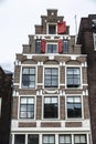 Old traditional leaning house in Amsterdam, Netherlands Royalty Free Stock Photo