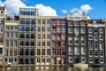 Old traditional leaning houses along the canal in Amsterdam, Netherlands Royalty Free Stock Photo