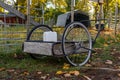 Old traditional pushcart in front of animal enclosure Royalty Free Stock Photo