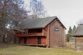 Old traditional red painted wooden building. Royalty Free Stock Photo