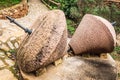 Old traditional stone millstones, exposed outdoors in Spain