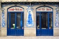 Old traditional store front with ceramic tiles in Lisbon Portugal.