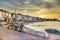 Old traditional stores and buildings on Anargirou street at sunset, Spetses, Greece.