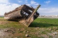 Old traditional Tagus River sailboat burnt and wrecked in Seixal Bay Royalty Free Stock Photo