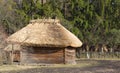 Old traditional Ukrainen barn or shack under blue sky