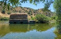 Old traditional watermills in the Guadiana river at Azenhas. Mertola. Portugal