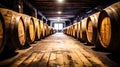 Old traditional wooden barrels with wine, cognac, whiskey, brandy in storage, lined up in a cool and dark cellar