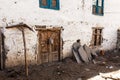 Old traditional wooden door and window a in small local village in Nepal, Himalaya Royalty Free Stock Photo