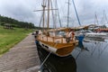 Old traditional wooden yacht docking in Korektywa boathouse