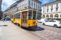 The old and traditional yellow tram in Milan, Italy