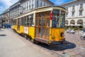 The old and traditional yellow tram in Milan, Italy