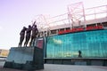 The United Trinity or The Holy Trinity in front of the Old Trafford stadium home of Manchester United.