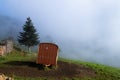 Old trailer on sheep field, farm in Europe Royalty Free Stock Photo