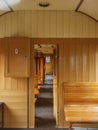 Old train carriage with wooden benches Royalty Free Stock Photo