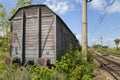 Old cargo train cart abandoned on a disused train line Royalty Free Stock Photo