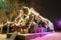 An old train decorated with multi-colored New Year's illuminations.