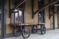 Old train luggage and cargo cart at train station Royalty Free Stock Photo