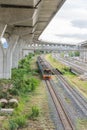 Old train model at rail system serving the Bangkok Metropolitan Region in Thailand